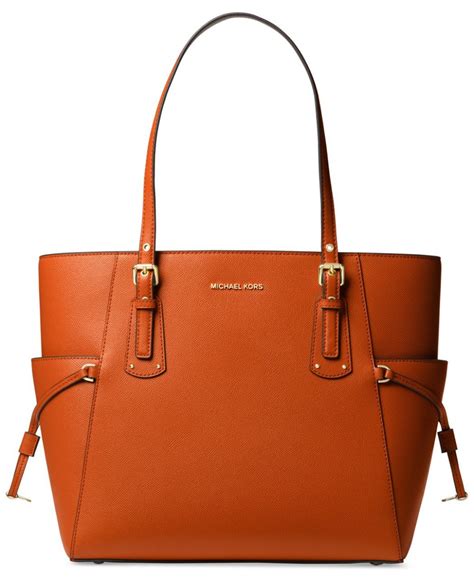 michael kors voyager east west tote burnt orange|Michael Kors voyager tote merlot.